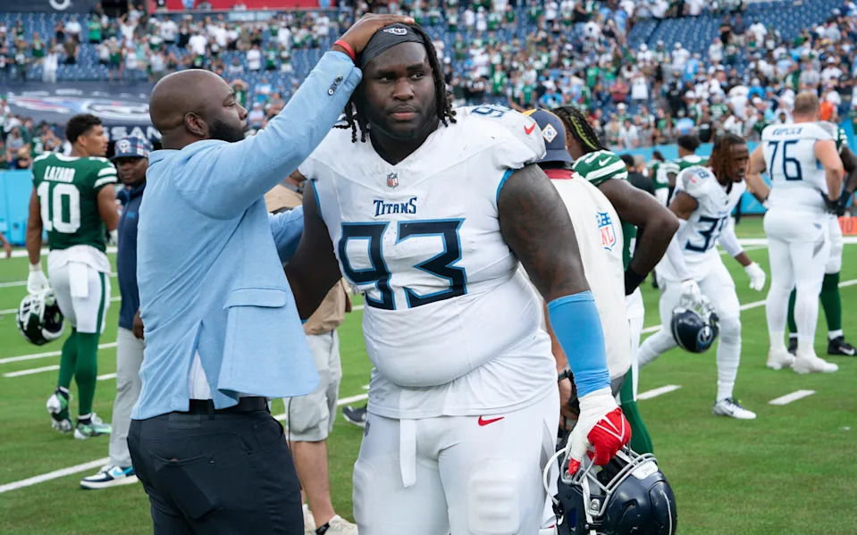 Tennessee Titans General Manager Ran Carthon greets Tennessee Titans defensive tackle T'Vondre Sweat (93) after their 24-17 loss to the New York Jets at Nissan Stadium in Nashville, Tenn., Sunday, Sept. 15, 2024.