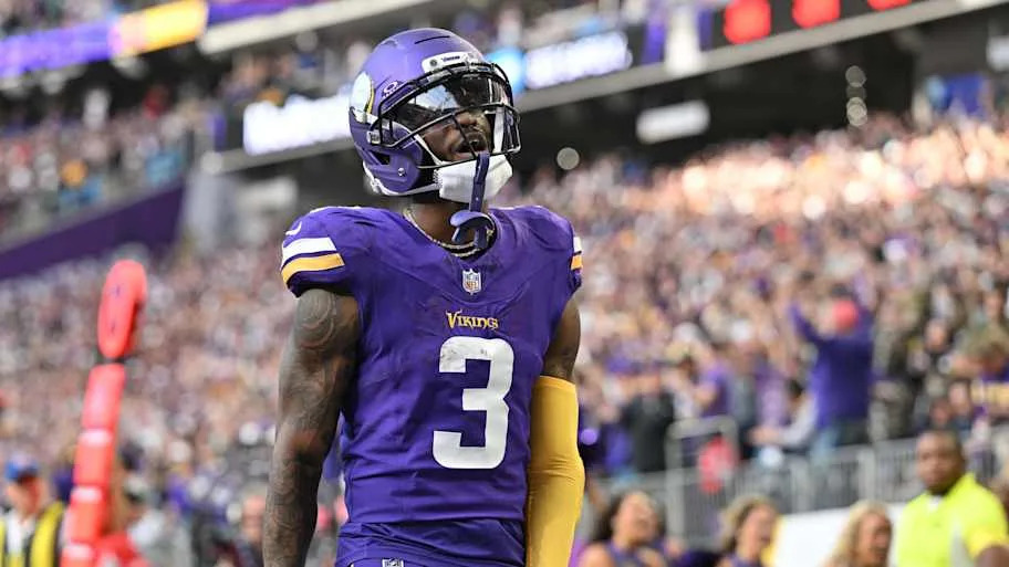 Addison celebrates after scoring a touchdown during the fourth quarter against the Chicago Bears at U.S. Bank Stadium. 