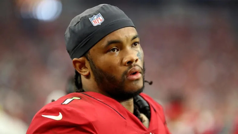 Kyler Murray looking downfield during a Cardinals game against the Houston Texans at State Farm Stadium. Vikings free agency predictions