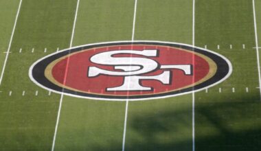 The San Francisco 49ers logo at midfield