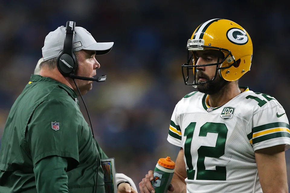 Green Bay Packers head coach Mike McCarthy talks to quarterback Aaron Rodgers (12) during the second half of an NFL football game against the Detroit Lions in Detroit, Michigan USA, on Sunday, October 7,  2018. (Photo by Jorge Lemus/NurPhoto via Getty Images)
