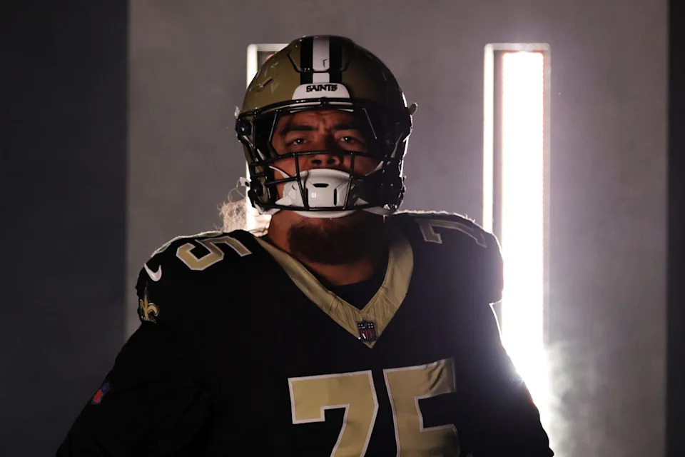 NEW ORLEANS, LOUISIANA - OCTOBER 12: Taliese Fuaga #75 of the New Orleans Saints takes on the field in the game against the New England Patriots at Caesars Superdome on October 12, 2025 in New Orleans, Louisiana. (Photo by Stacy Revere/Getty Images)