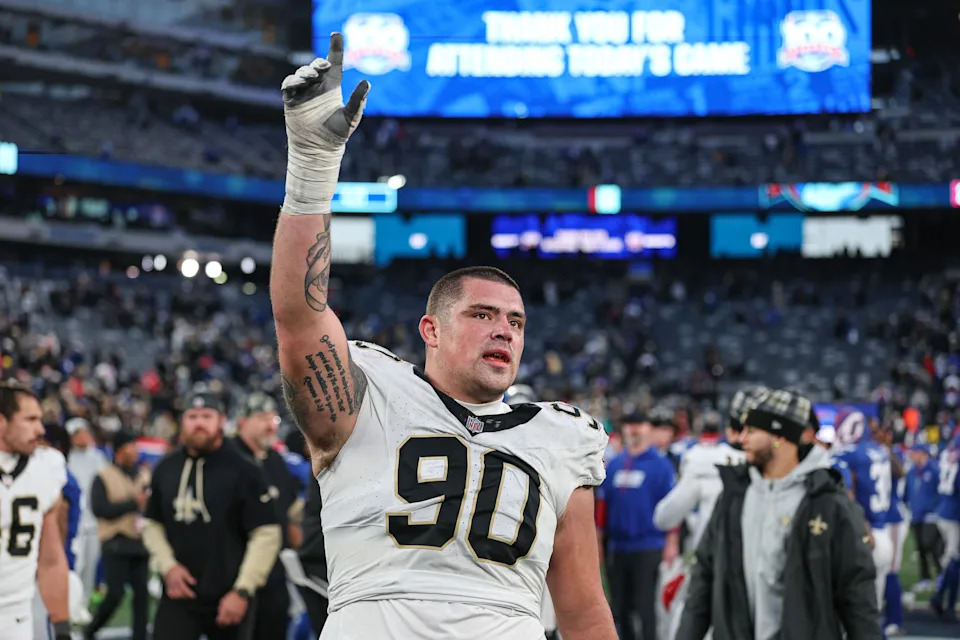 Dec 8, 2024; East Rutherford, New Jersey, USA; New Orleans Saints defensive tackle Bryan Bresee (90) celebrates after the game against the New York Giants at MetLife Stadium. Mandatory Credit: Vincent Carchietta-Imagn Images