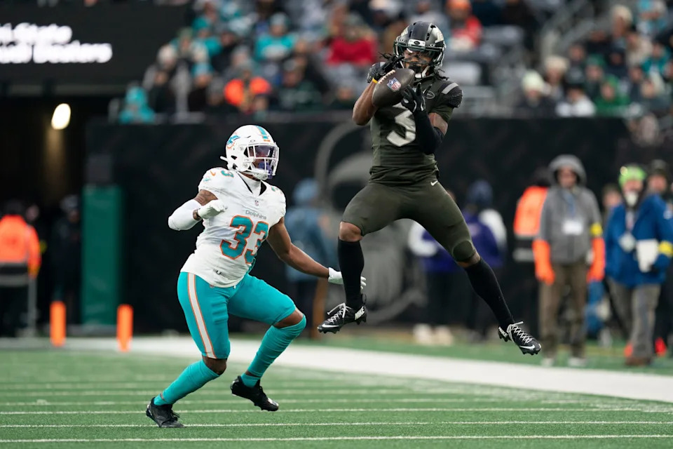 <p>New York Jets wide receiver John Metchie III (3) makes a catch while guarded by Miami Dolphins defensive back Jason Marshall Jr. (33) during a week 14 football game between the New York Jets and Miami Dolphins at MetLife Stadium on Sunday, Dec. 7, 2025.</p><br>