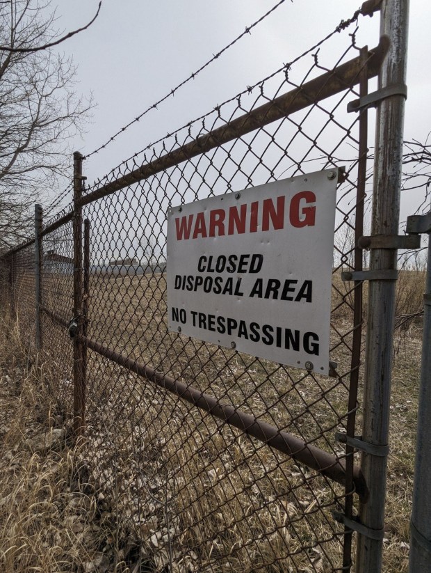 A sign at the former Federated Metals smelting plant in Whiting warns visitors to not trespass on an area of the property that is heavily contaminated with lead and other toxic chemicals. The U.S. Environmental Protection Agency put the site on the Superfund National Priorities List, a list of sites where releases of contamination pose significant human health and environmental risks, in 2023. (Christin Nance Lazerus / Post-Tribune)