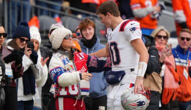 Ann Michael Maye greets New England Patriots quarterback Drake Maye before the AFC Championship game against the Denver Broncos.