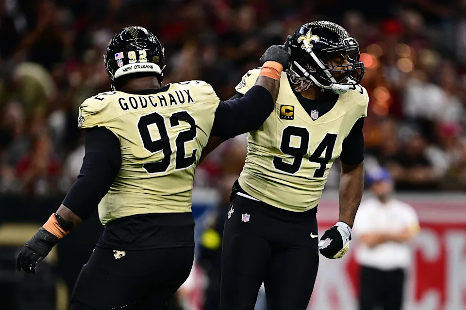 NEW ORLEANS, LOUISIANA - SEPTEMBER 07: Cameron Jordan #94 of the New Orleans Saints celebrates with Davon Godchaux #92 after sacking Kyler Murray #1 of the Arizona Cardinals (not pictured) during the game at Caesars Superdome on September 07, 2025 in New Orleans, Louisiana. (Photo by Ella Hall/Getty Images)