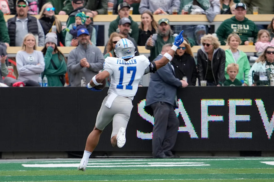 Sep 10, 2022; Fort Collins, Colorado, USA; Middle Tennessee Blue Raiders safety Tra Fluellen (17) scores a pick six touchdown on the first play from scrimmage at Sonny Lubick Field at Canvas Stadium. Mandatory Credit: Michael Madrid-USA TODAY Sports