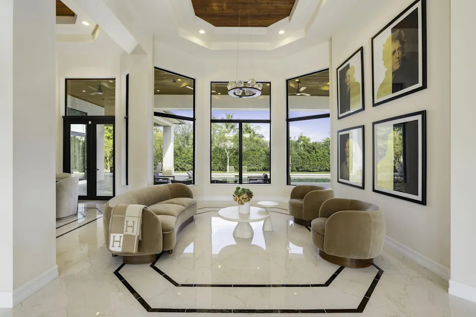 Living space with an Hermes blanket in a home in Florida bought by NFL player Sterling Shepard