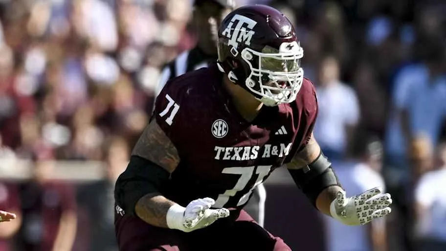 Texas A&M offensive lineman Chase Bisontis blocks against the Auburn Tigers.
