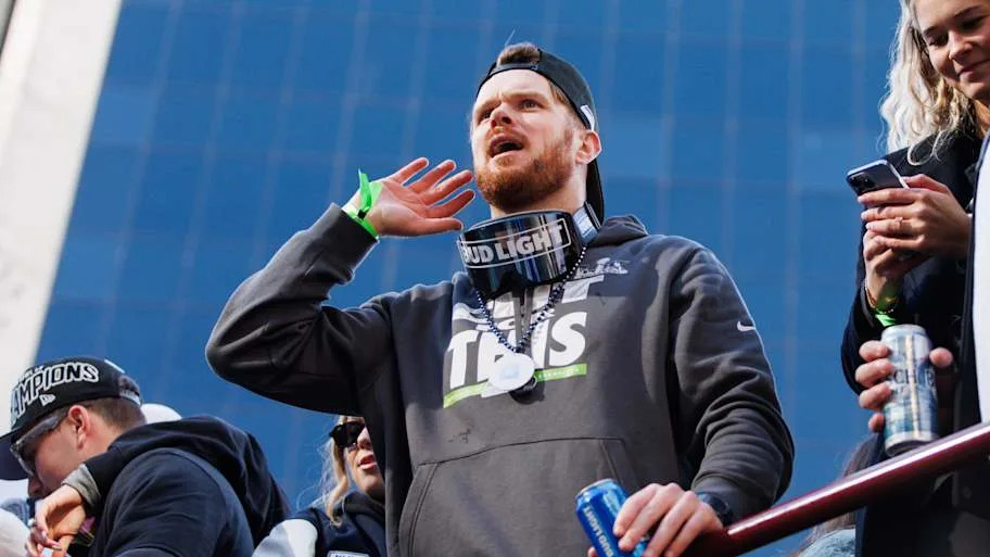 Seattle Seahawks quarterback Sam Darnold reacts during the Super Bowl LX parade