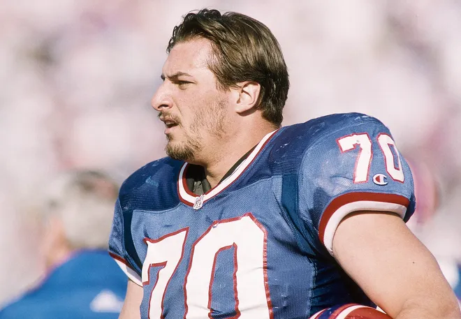 Jan 31, 1993; Pasadena, CA, USA; FILE PHOTO; Buffalo Bills offensive lineman John Fina (70) on the field prior to Super Bowl XXVII against the Dallas Cowboys at the Rose Bowl. The Cowboys defeated the Bills 52-17. Mandatory Credit: Manny Rubio-USA TODAY Sports
