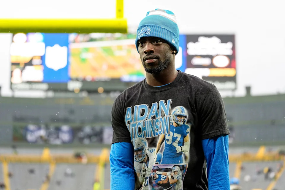 Detroit Lions cornerback Terrion Arnold walks off the field during warmups before the Green Bay Packers game at Lambeau Field in Green Bay, Wis. on Sunday, Nov. 3, 2024. He was wearing a T-shirt in support of injured teammate Aidan Hutchinson.