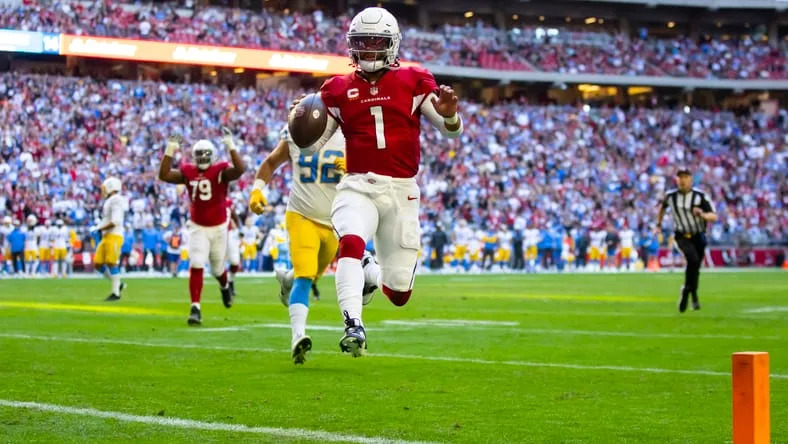 Nov 27, 2022; Glendale, AZ, USA; Arizona Cardinals quarterback Kyler Murray (1) scores a touchdown against the Los Angeles Chargers in the first half at State Farm Stadium. Mandatory Credit: Mark J. Rebilas-USA TODAY Sports