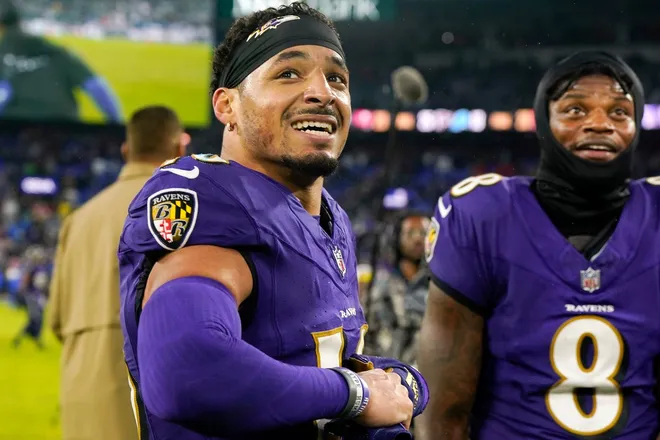 Dec 10, 2023; Baltimore, Maryland, USA; Baltimore Ravens wide receiver Tylan Wallace (16) and quarterback Lamar Jackson (8) celebrate after winning in overtime against the Los Angeles Rams at M&T Bank Stadium. Mandatory Credit: Jessica Rapfogel-USA TODAY Sports