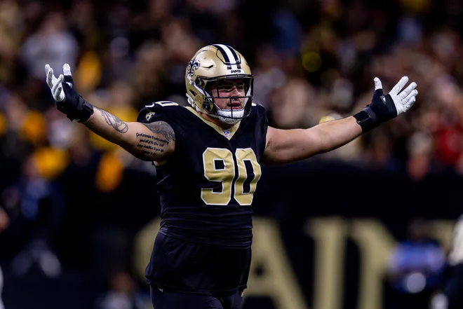Nov 17, 2024; New Orleans, Louisiana, USA; New Orleans Saints defensive tackle Bryan Bresee (90) reacts to sacking Cleveland Browns quarterback Jameis Winston (5) during the second half at Caesars Superdome. Mandatory Credit: Stephen Lew-Imagn Images
