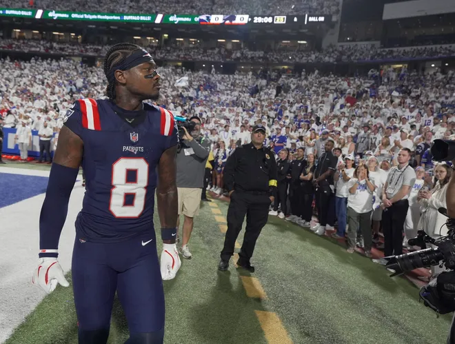 Stefon Diggs, a former Bills player, looks around at the crowd as the crowd has a mixed reaction to his return with another team before the Bills home game against the New England Patriots at Highmark Stadium in Orchard Park on Oct. 5, 2025.