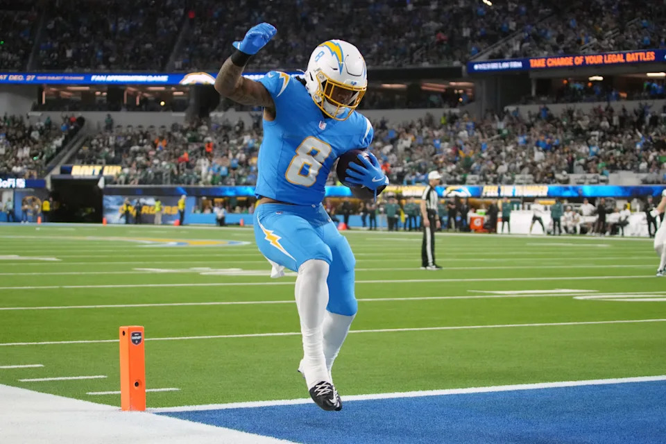 Los Angeles Chargers running back Omarion Hampton (8) runs for a touchdown against the Philadelphia Eagles
