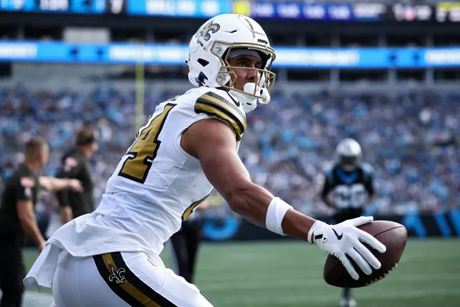 CHARLOTTE, NORTH CAROLINA - NOVEMBER 09: Devaughn Vele #14 of the New Orleans Saints celebrates a catch against the Carolina Panthers during the first half in the game at Bank of America Stadium on November 09, 2025 in Charlotte, North Carolina. (Photo by Jared C. Tilton/Getty Images)