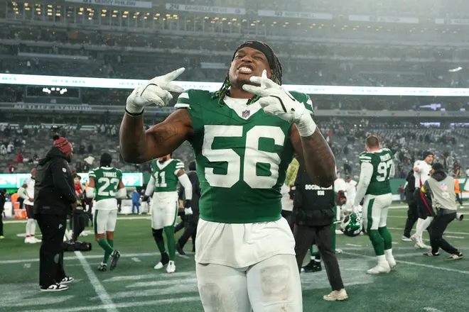 EAST RUTHERFORD, NEW JERSEY - NOVEMBER 30: Quincy Williams #56 of the New York Jets celebrates after the game against the Atlanta Falcons at MetLife Stadium on November 30, 2025 in East Rutherford, New Jersey. (Photo by Elsa/Getty Images)