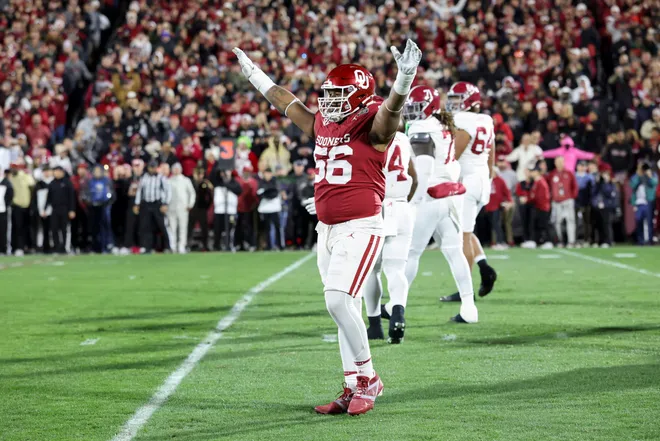 Dec 19, 2025; Norman, OK, USA; Oklahoma Sooners defensive lineman Gracen Halton (56) gestures in the first half against the Alabama Crimson Tide at Gaylord Family OK Memorial Stadium. Mandatory Credit: Nelson Chenault-Imagn Images