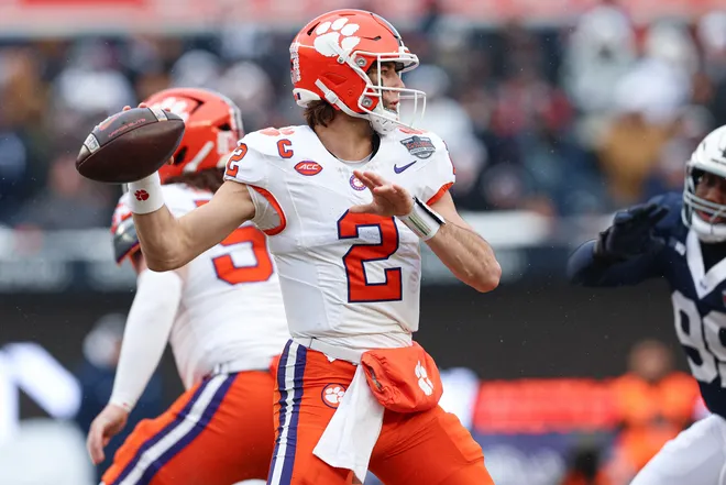 Dec 27, 2025; Bronx, NY, USA; Clemson Tigers quarterback Cade Klubnik (2) throws the ball during the first half of the 2025 Pinstripe Bowl against the Penn State Nittany Lions at Yankee Stadium. Mandatory Credit: Vincent Carchietta-Imagn Images