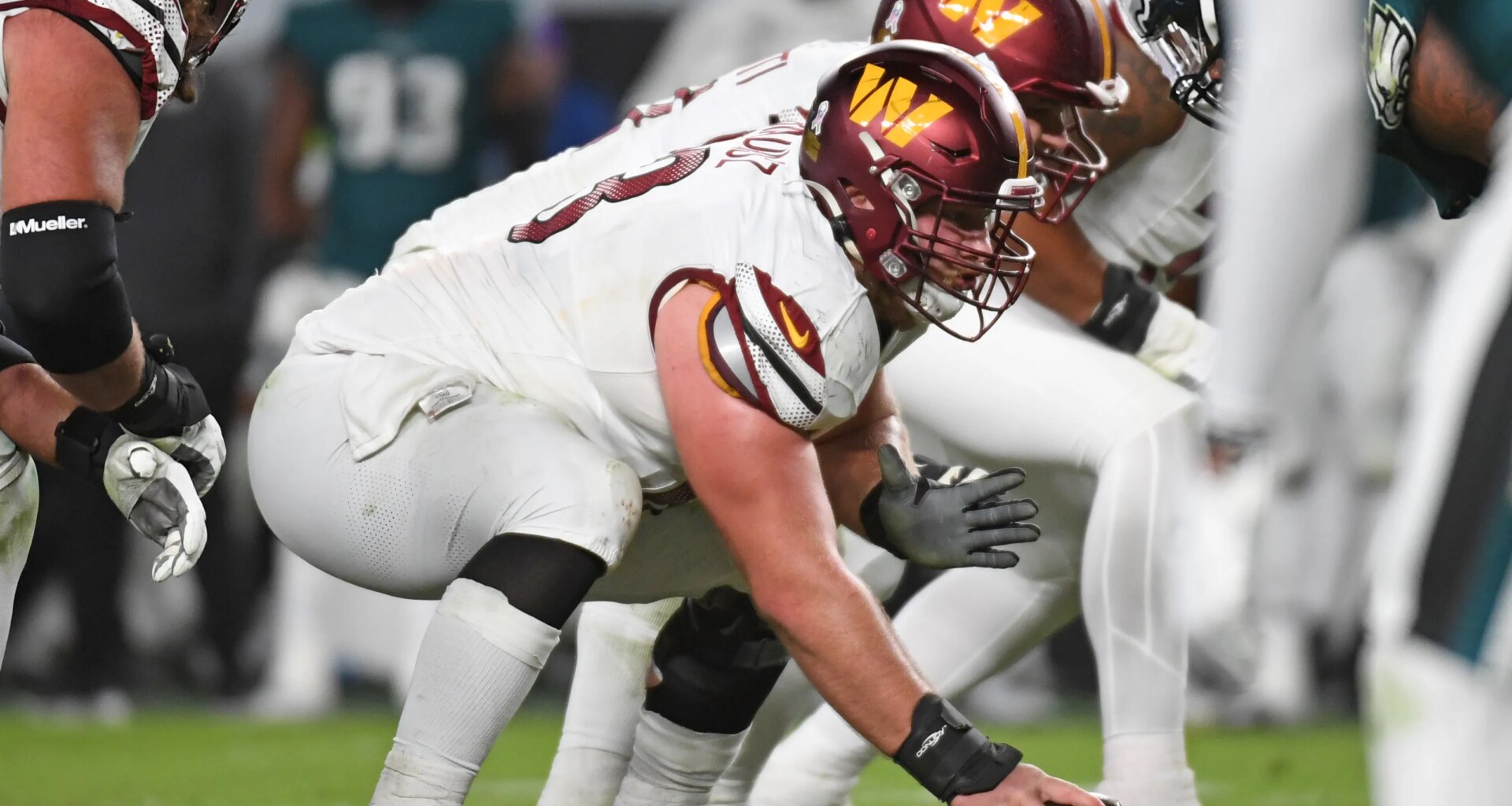 Wisconsin football Tyler Biadasz Commanders release contract