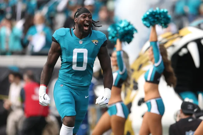 Jan 11, 2026; Jacksonville, FL, USA; Jacksonville Jaguars linebacker Devin Lloyd (0) runs on the field before an AFC Wild Card Round game against the Buffalo Bills at EverBank Stadium. Mandatory Credit: Nathan Ray Seebeck-Imagn Images
