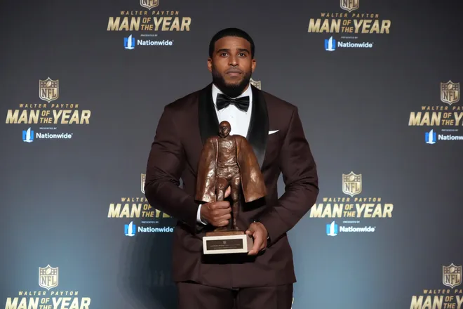 Feb 5, 2026; San Francisco, CA, USA; Washington Commanders linebacker Bobby Wagner poses with the Walter Payton Man of the Year award at the NFL Honors show at Palace of Fine Arts. Mandatory Credit: Kirby Lee-Imagn Images