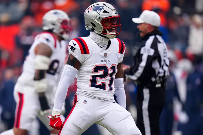 Jan 25, 2026; Denver, CO, USA; New England Patriots safety Jaylinn Hawkins (21) reacts against the Denver Broncos during the first half in the 2026 AFC Championship Game at Empower Field at Mile High. Mandatory Credit: Ron Chenoy-Imagn Images