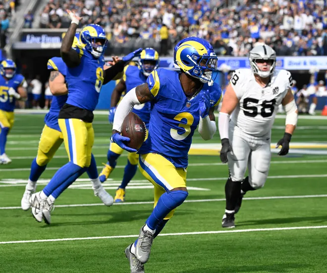 Oct 20, 2024; Inglewood, California, USA; Los Angeles Rams safety Kamren Curl (3) picks up a fumble by Las Vegas Raiders quarterback Gardner Minshew (not pictured) in the second quarter at SoFi Stadium and runs it back for a touchdown. Mandatory Credit: Robert Hanashiro-Imagn Images