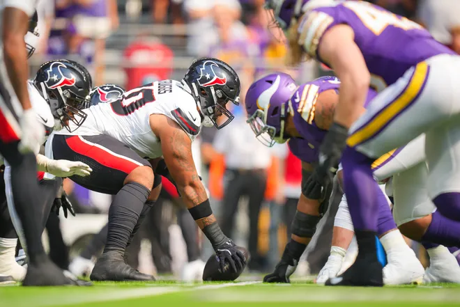 Sep 22, 2024; Minneapolis, Minnesota, USA; Houston Texans center Juice Scruggs (70) at the line of scrimmage against the Minnesota Vikings in the first quarter at U.S. Bank Stadium. Mandatory Credit: Brad Rempel-Imagn Images