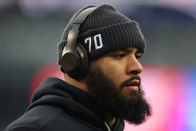 FOXBOROUGH, MASSACHUSETTS - JANUARY 18: Juice Scruggs #70 of the Houston Texans warms up prior to the AFC Divisional Playoff game against the New England Patriots at Gillette Stadium on January 18, 2026 in Foxborough, Massachusetts. (Photo by Elsa/Getty Images)