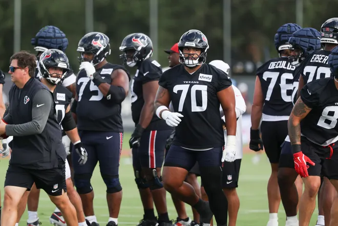 Jul 23, 2025; Houston, TX, USA; Houston Texans center/guard Juice Scruggs (70) during training camp at Houston Methodist Training Center. Mandatory Credit: Troy Taormina-Imagn Images