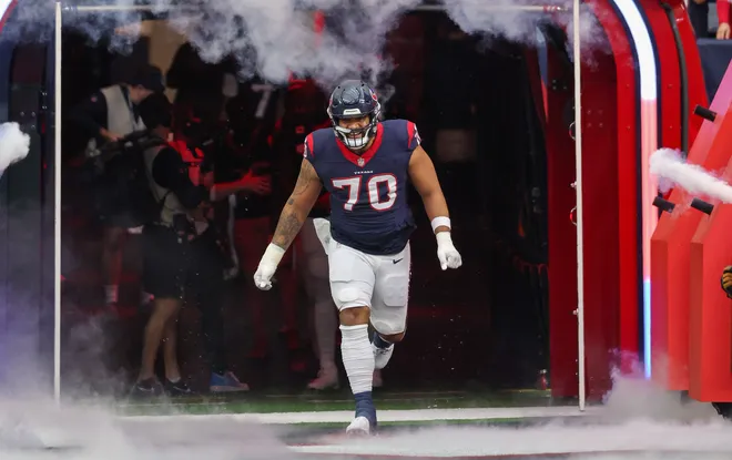 Dec 3, 2023; Houston, Texas, USA; Houston Texans center Juice Scruggs (70) is introduced before playing against the Denver Broncos at NRG Stadium. Mandatory Credit: Thomas Shea-USA TODAY Sports