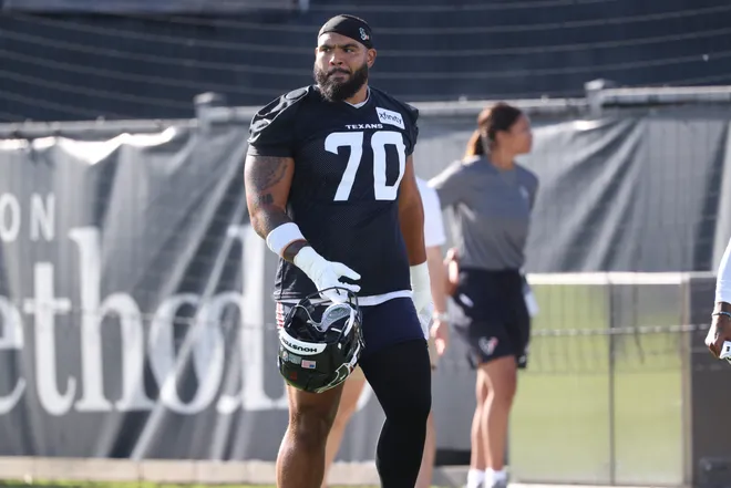 Jul 23, 2025; Houston, TX, USA; Houston Texans center/guard Juice Scruggs (70) during training camp at Houston Methodist Training Center. Mandatory Credit: Troy Taormina-Imagn Images