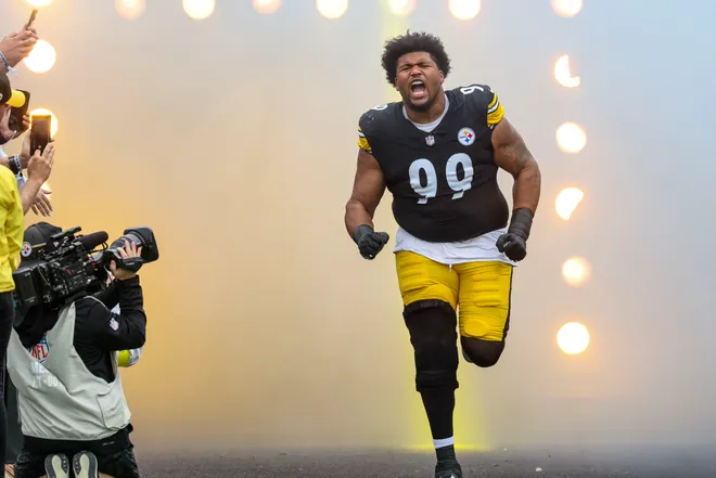 Pittsburgh Steelers defensive tackle Derrick Harmon runs on to the field before the game at Acrisure Stadium.