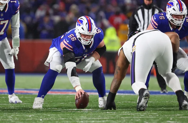 Connor McGovern #66 of the Buffalo Bills waits to snap the ball against the Baltimore Ravens during the AFC divisional round game at Highmark Stadium on January 19, 2025 in Orchard Park, New York.