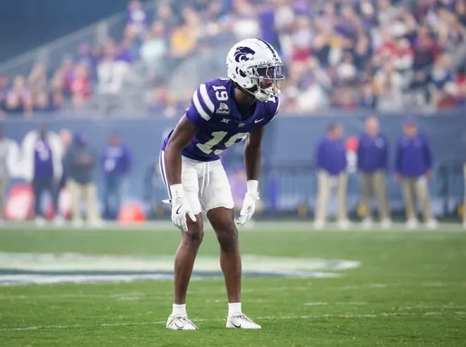 Dec 26, 2024; Phoenix, AZ, USA; Kansas State Wildcats safety VJ Payne (19) against the Rutgers Scarlet Knights during the Rate Bowl at Chase Field. Mandatory Credit: Mark J. Rebilas-Imagn Images