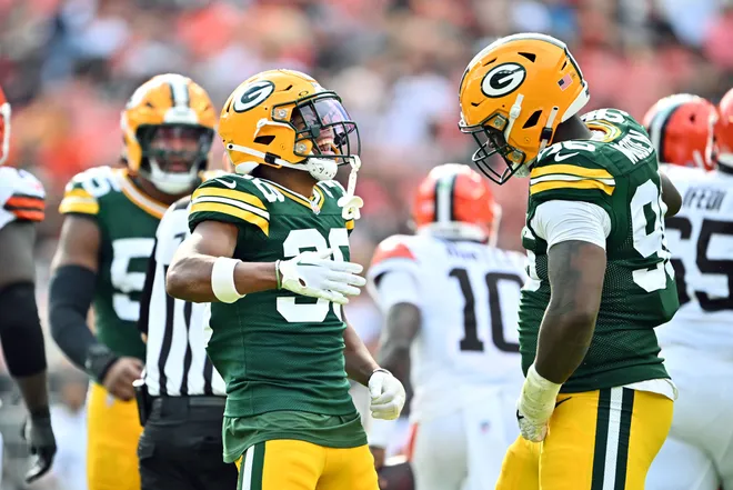 CLEVELAND, OHIO - AUGUST 10: Safety Anthony Johnson Jr. #36 and defensive tackle Colby Wooden #96 of the Green Bay Packers celebrate after a play during the first half against the Cleveland Browns at Cleveland Browns Stadium on August 10, 2024 in Cleveland, Ohio. (Photo by Jason Miller/Getty Images)