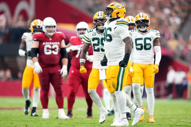 Oct 19, 2025; Glendale, Arizona, USA; Green Bay Packers defensive end Colby Wooden (96) celebrates a sack against the Arizona Cardinals during the first half at State Farm Stadium. Mandatory Credit: Joe Camporeale-Imagn Images