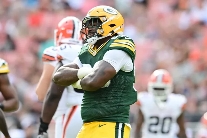 Aug 10, 2024; Cleveland, Ohio, USA; Green Bay Packers defensive tackle Colby Wooden (96) celebrates a sack during the second quarter against the Cleveland Browns at Cleveland Browns Stadium. Mandatory Credit: Ken Blaze-USA TODAY Sports