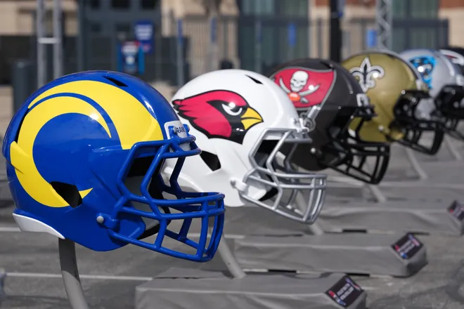 Feb 26, 2026; Indianapolis, IN, USA; Large helmets of the Los Angeles Rams, Arizona Cardinals, Tampa Bay Buccaners and New Orleans Saints at the NFL Scouting Combine at Lucas Oil Stadium. Mandatory Credit: Kirby Lee-Imagn Images