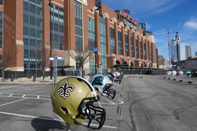 Feb 28, 2026; Indianapolis, IN, USA; Large New Orleans Saints and Carolina Panthers helmets at the NFL Scouting Combine Experience at Lucas Oil Stadium. Mandatory Credit: Kirby Lee-Imagn Images