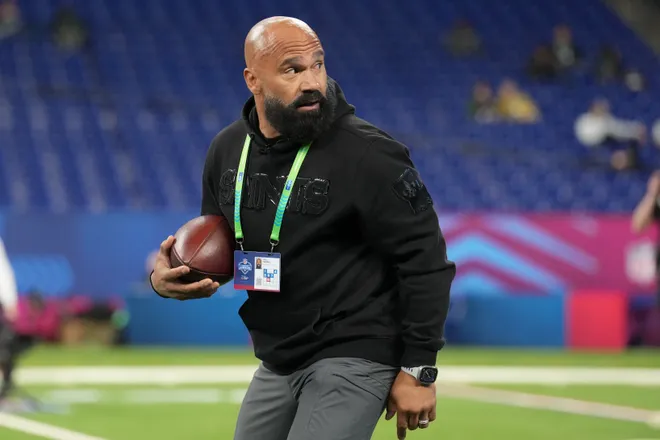 Feb 28, 2026; Indianapolis, IN, USA; New Orleans Saints running backs coach Joel Thomas looks on during the NFL Scouting Combine at Lucas Oil Stadium. Mandatory Credit: Kirby Lee-Imagn Images