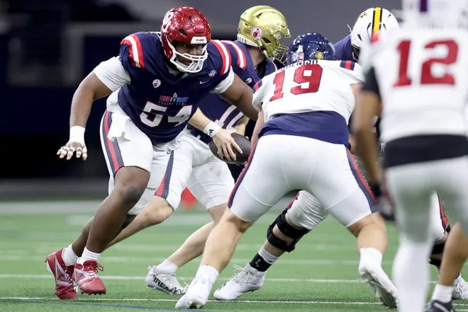 FRISCO, TEXAS - JANUARY 27: Febechi Nwaiwu #54 from Oklahoma playing for the West Team attempts to make a block during the fourth quarter against the East Team during the 2026 East-West Shrine Bowl at Ford Center on January 27, 2026 in Frisco, Texas. (Photo by Tim Heitman/Getty Images)
