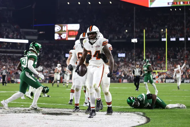 Dec 28, 2023; Cleveland, Ohio, USA; Cleveland Browns running back Jerome Ford (34) scores a touchdown during the first half against the New York Jets at Cleveland Browns Stadium. Mandatory Credit: Scott Galvin-USA TODAY Sports