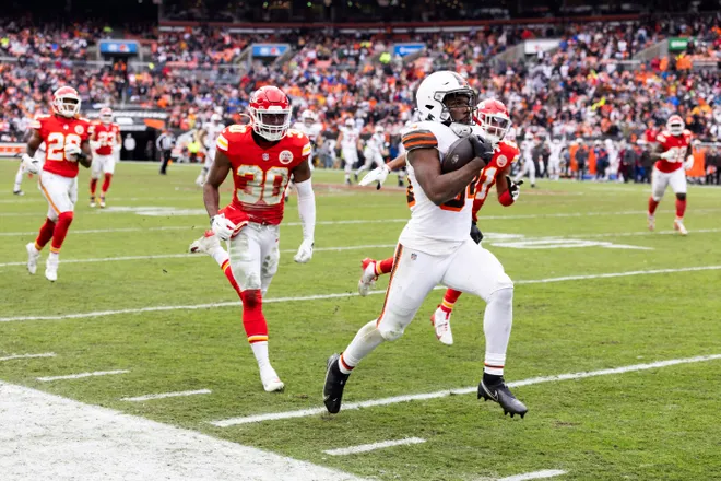 Dec 15, 2024; Cleveland, Ohio, USA; Cleveland Browns running back Jerome Ford (34) runs for a touchdown against the Kansas City Chiefs during the third quarter at Huntington Bank Field. Mandatory Credit: Scott Galvin-Imagn Images
