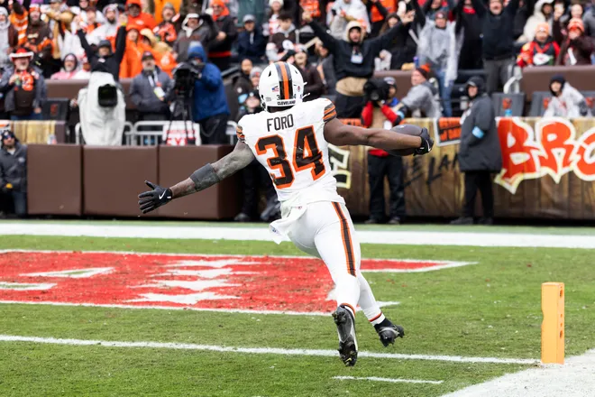 Dec 15, 2024; Cleveland, Ohio, USA; Cleveland Browns running back Jerome Ford (34) runs for a touchdown against the Kansas City Chiefs during the third quarter at Huntington Bank Field. Mandatory Credit: Scott Galvin-Imagn Images