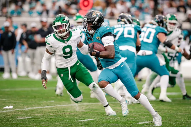 Dec 14, 2025; Jacksonville, Florida, USA;Jacksonville Jaguars wide receiver Dyami Brown (5) runs the ball against the New York Jets at EverBank Stadium. Mandatory Credit: Travis Register-Imagn Images